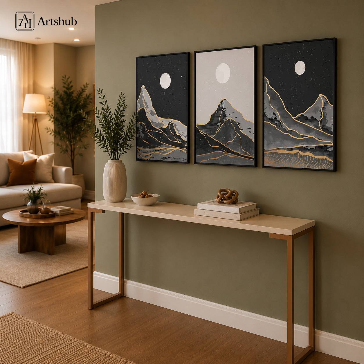 Artshub Moonlit Mountain Gold Line triptych 3 panel framed canvas wall art in warm olive green entryway above oak console with ribbed vase and decorative objects — charcoal grey gold