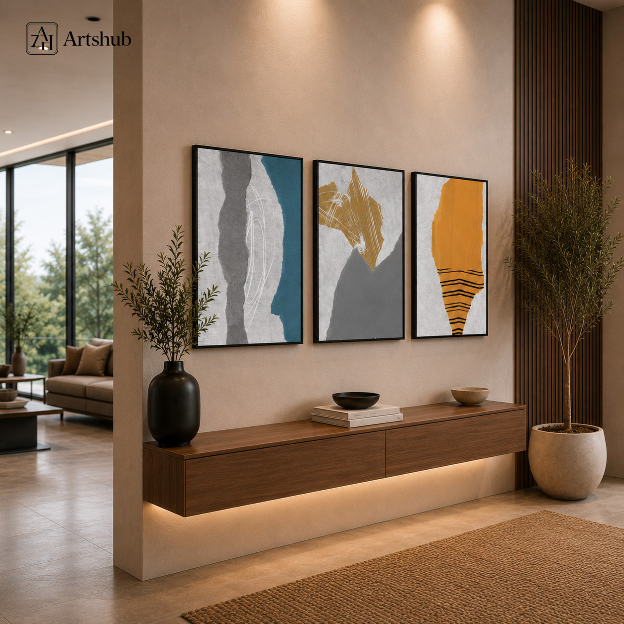 Artshub Abstract Teal Grey Amber 3 panel triptych canvas wall art in modern luxury entryway above floating console with black vase and olive tree warm ambient lighting