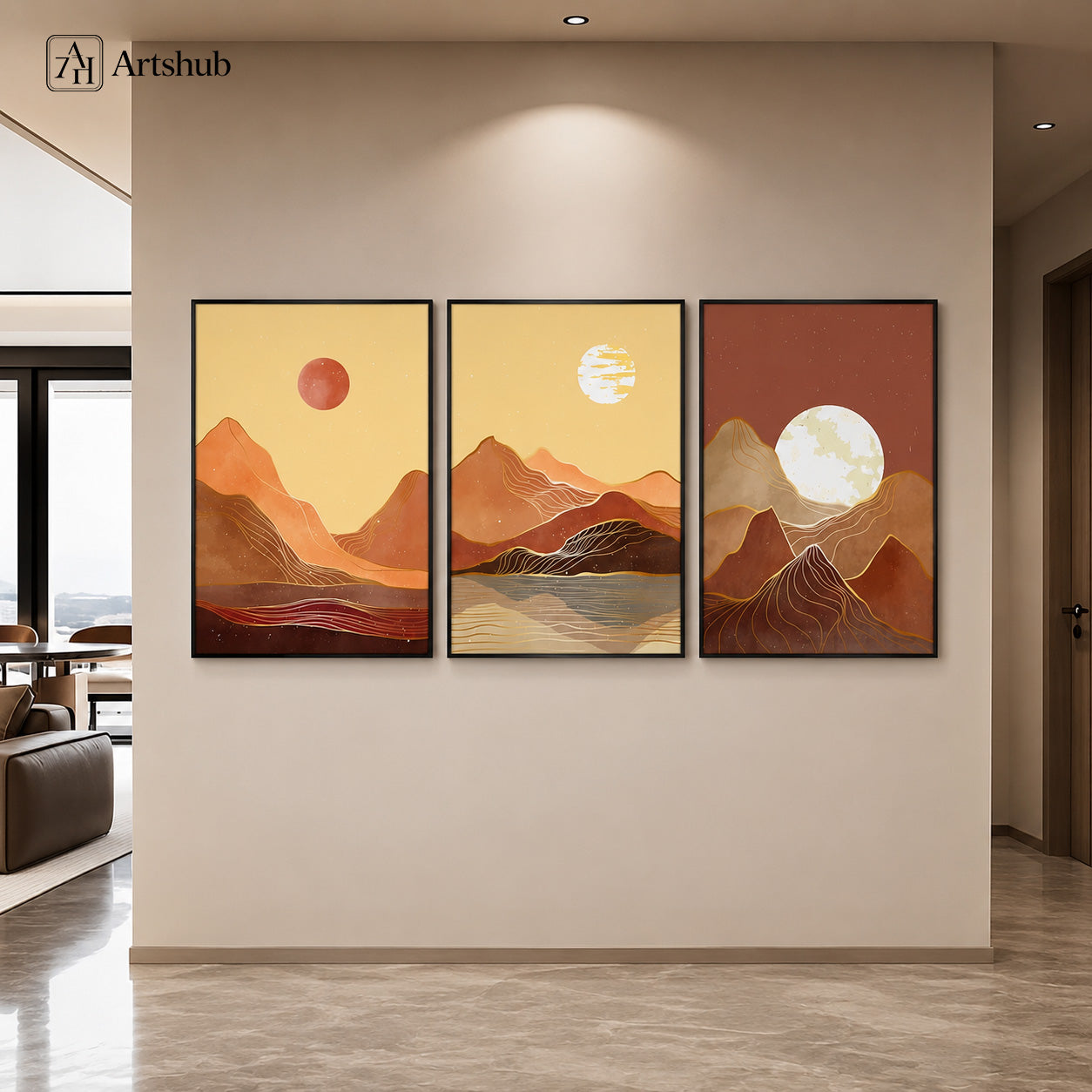 Artshub Terracotta Mountain Sunset Gold Line triptych 3 panel framed canvas wall art in warm beige entryway corridor on cream wall with recessed lighting — terracotta amber burnt sienna matte black frame