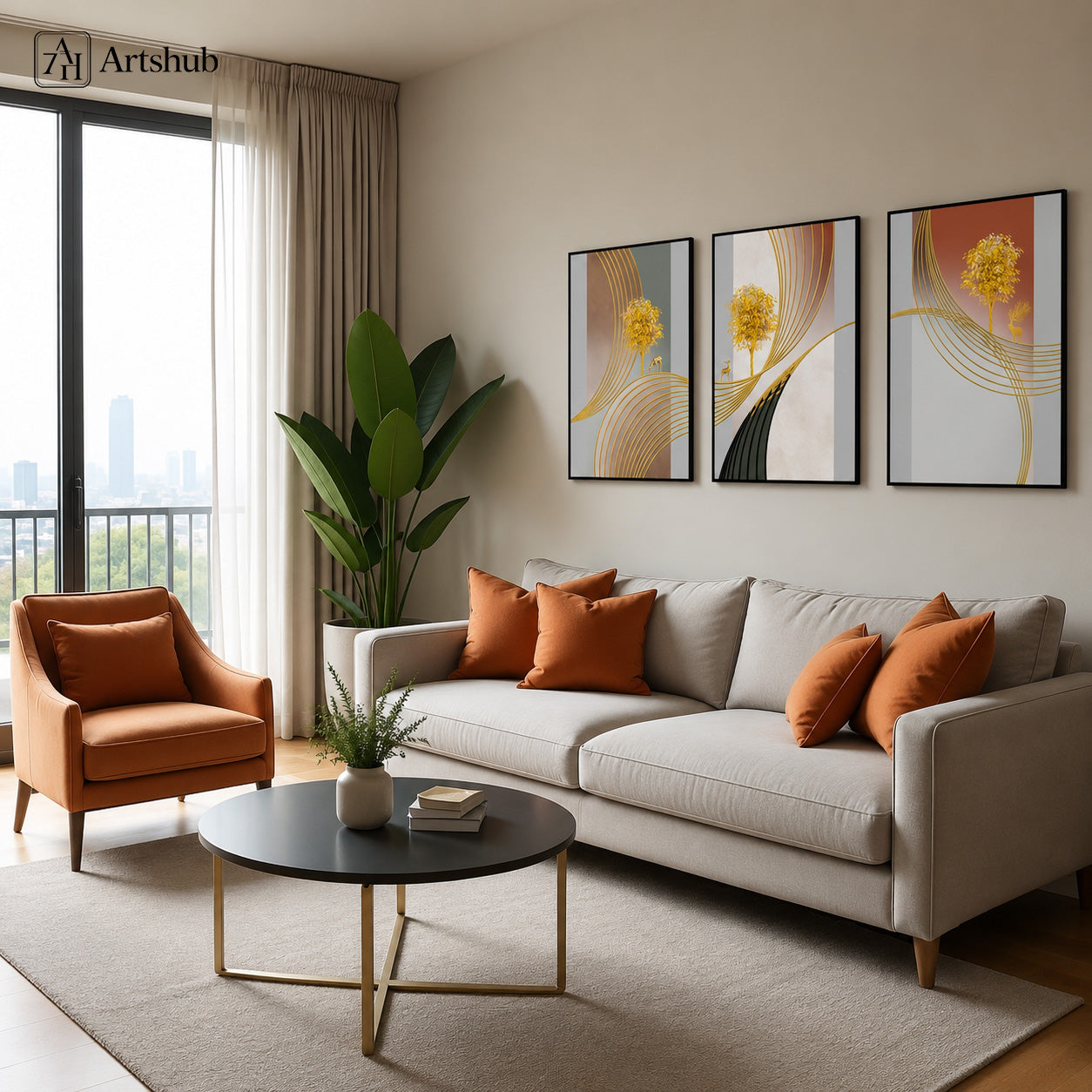 Artshub Golden Serenity Tree Gold Line triptych 3 panel framed canvas wall art in modern living room above grey sofa with orange cushions and round black coffee table — gold ivory terracotta