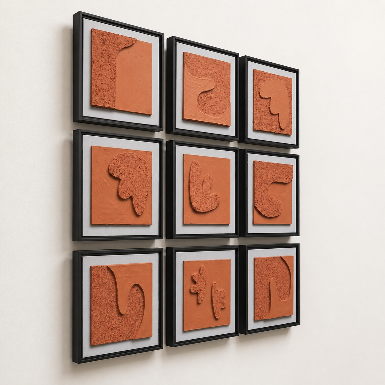 Artshub Terra Sculpt – Art That Defines Space lifestyle banner – 9-panel handcrafted sculptural terracotta 3D relief framed wall art set displayed in a 3x3 grid on a cream wall in a luxury home office with walnut bookcase, leather chair, wooden desk and table lamp – Handcrafted Premium Texture, Museum Quality, Exclusive Design, Limited Edition Curated Collection