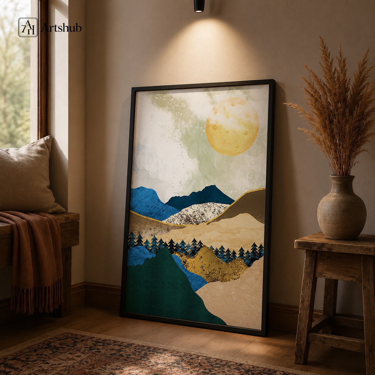 Artshub Moonlit Horizons Cobalt Blue Mountain Gold Sun Pine Silhouette single panel framed canvas wall art on warm beige wall above cream sofa in modern living room with track spotlight black round side table pampas grass — cobalt blue gold matte black frame
