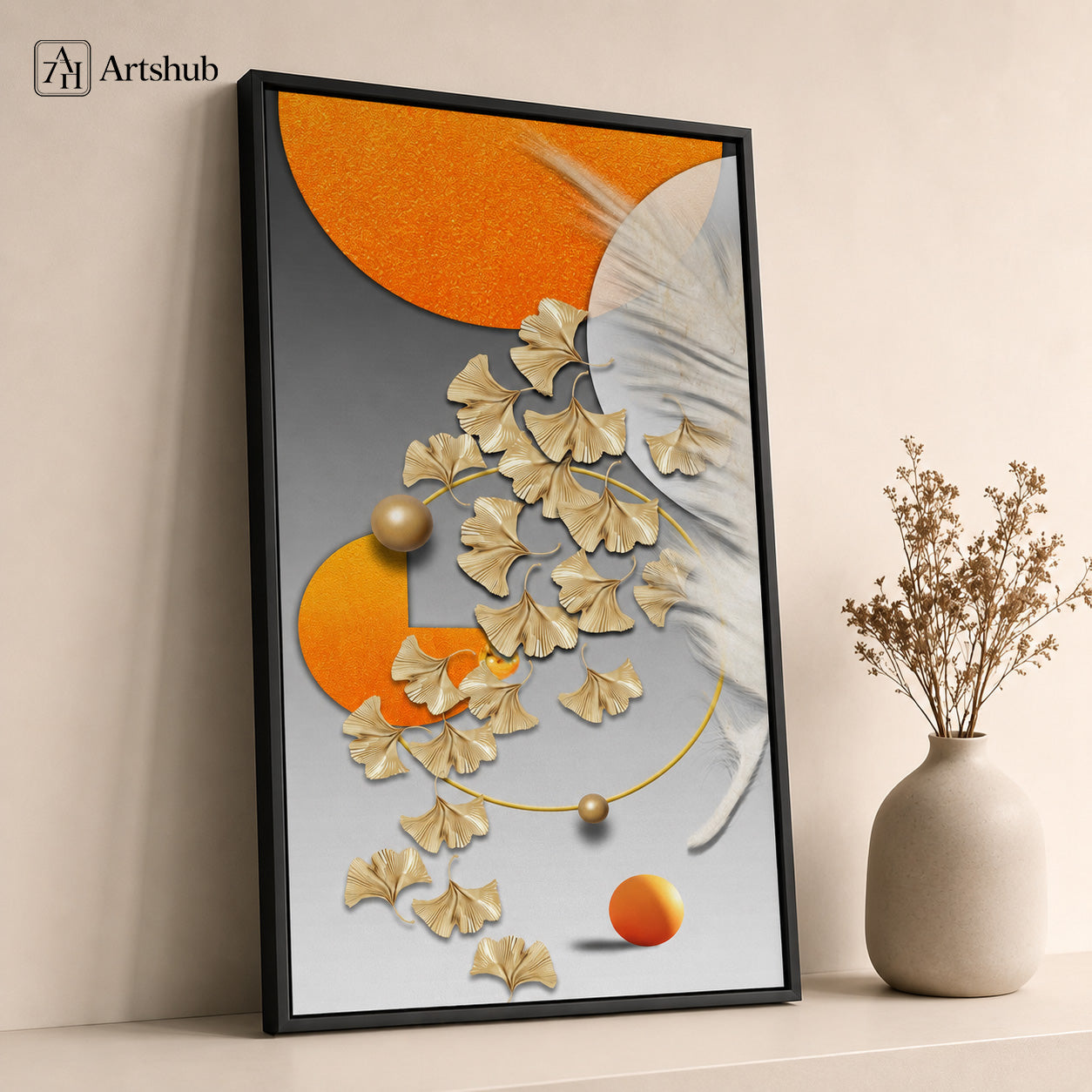 Artshub Golden Whisper 3D Sculpted Gold Ginkgo Leaves Orange Sun White Feather single panel framed canvas wall art leaning on warm cream wall on shelf with cream ceramic vase dried botanicals — gold orange grey matte black frame