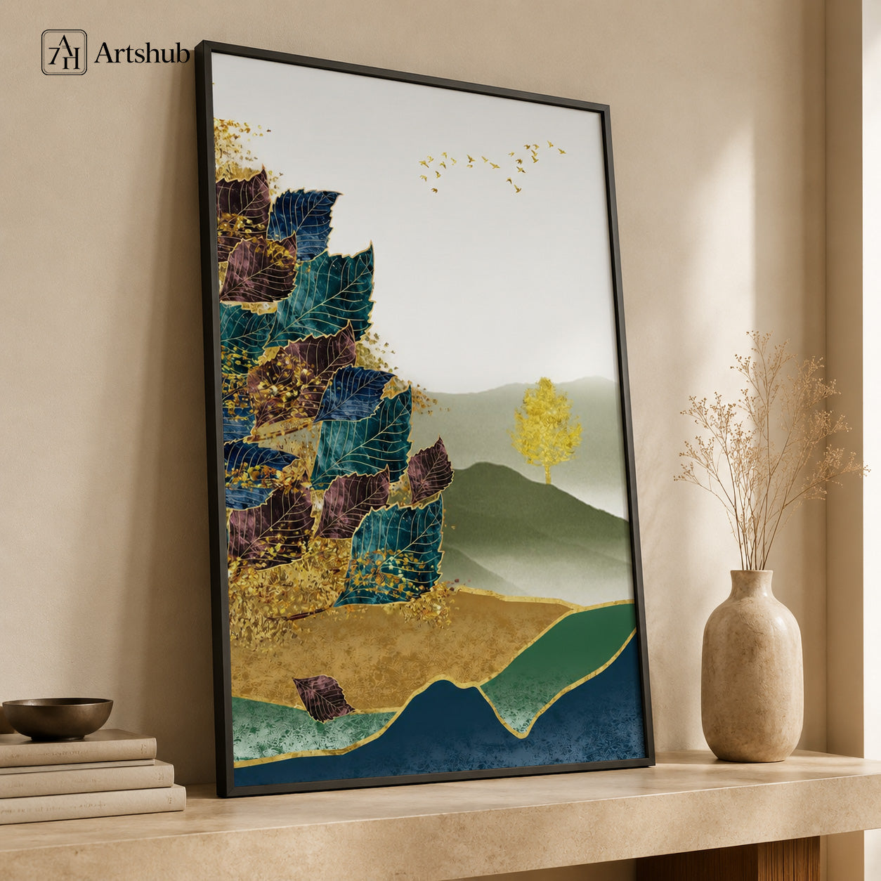Artshub Botanical Harmony Teal Plum Layered Leaves Golden Tree Misty Mountain single panel framed canvas wall art leaning on warm taupe wall on marble console with Kinfolk books black bowl large cream ceramic vase dried botanicals — teal plum gold matte black frame