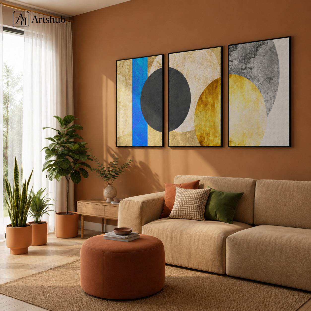 Artshub Abstract Geometric Eclipse 3 panel triptych canvas wall art in warm boho living room corner with natural light plants and round ottoman