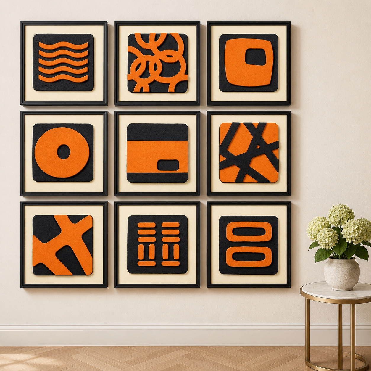 Artshub Signal Blocks 9-panel handcrafted 3D geometric orange and black framed wall art set displayed in a 3x3 grid on a cream wall – close-up showing nine unique bold geometric motifs including wave lines, chain loops, square void, bull's-eye ring, split bar, cross-hatch, X-scatter, grid bars and double oval in vivid orange on deep charcoal black with gold side table and white hydrangeas